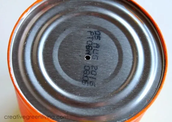 punch a hole for windchime craft Tin can with hole punched in middle
